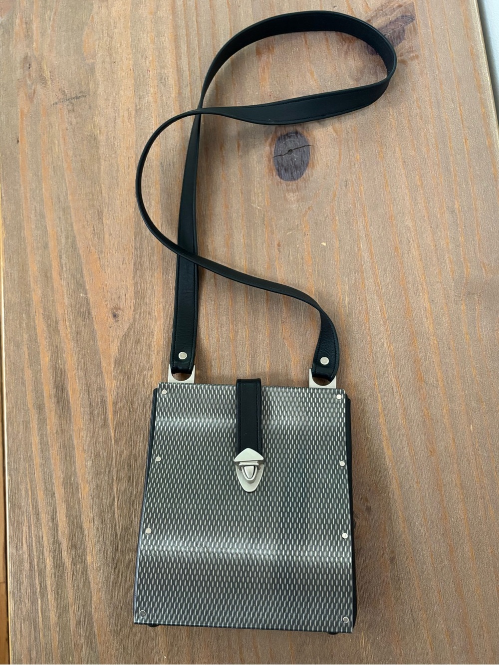 Wendy Stevens industrial stainless steel and leather drop bag mini $595